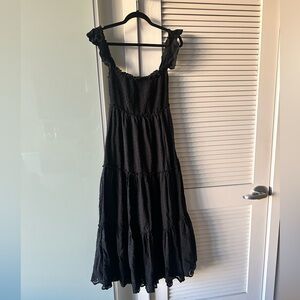 A tiered cotton-and-linen dress topped with a smocked bodice Maternity